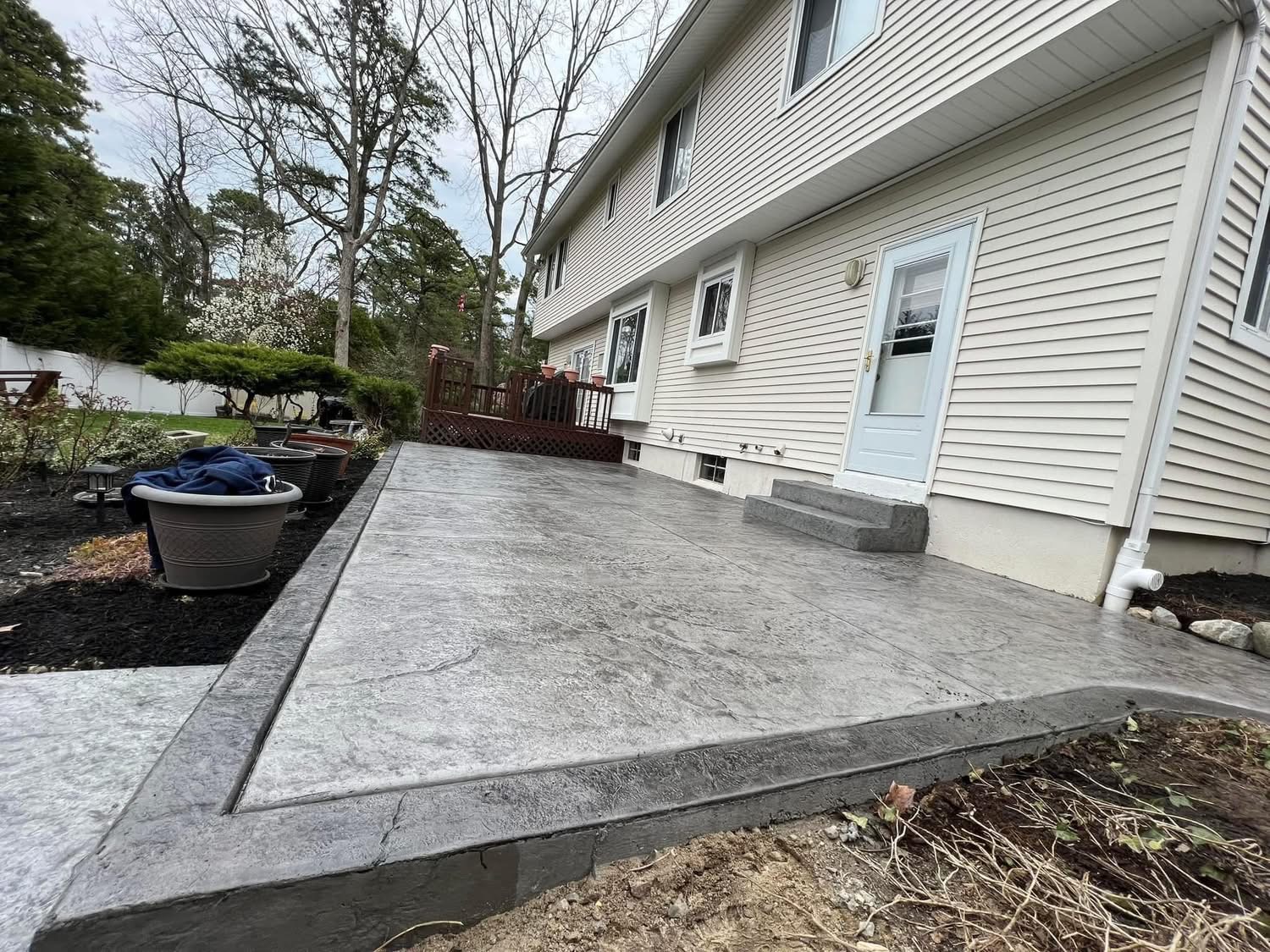 Stamped concrete patio in a South Jersey backyard